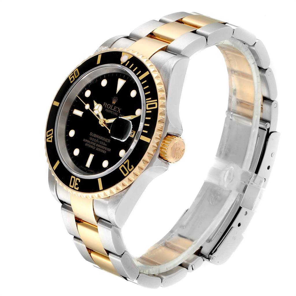 The Rolex Submariner 16613 Men
s Steel and Gold (two tone) Black Dial 16613 Men
s Steel and Gold (two tone) Black Dial is shown from a three-quarter angle, highlighting its dial, bezel, and two-tone bracelet.