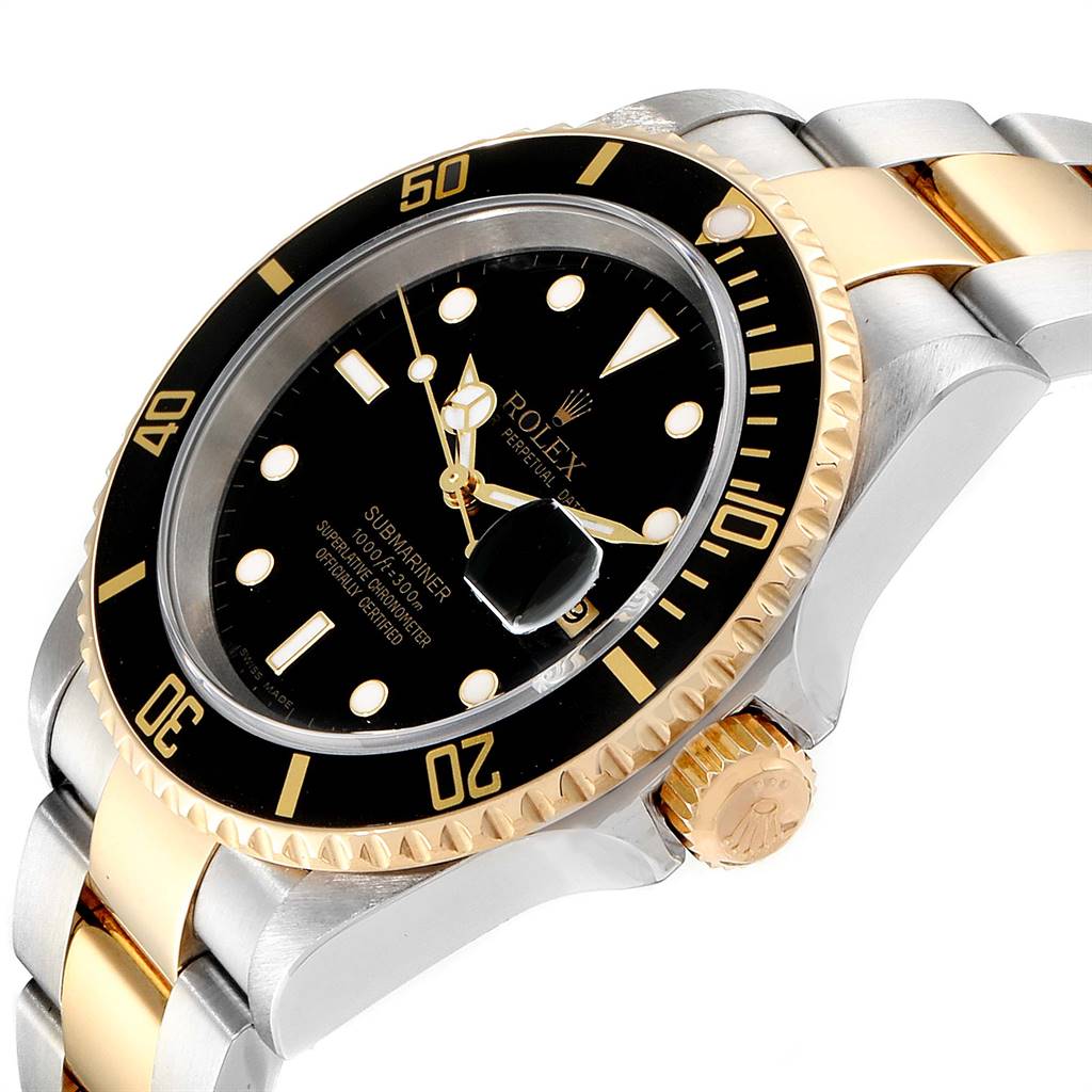 The image shows a Rolex Submariner 16613 Men
s Steel and Gold (two tone) Black Dial 16613 Men
s Steel and Gold (two tone) Black Dial watch at an angled view, highlighting the black dial, two-tone bracelet, and gold bezel.
