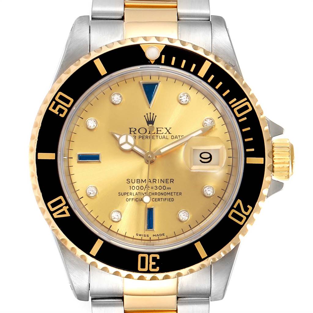 This image shows a front view of the Rolex Submariner 16613 Men
s Steel and Gold (two tone) Champagne Dial 16613 Men
s Steel and Gold (two tone) Champagne Dial watch, highlighting its gold dial, black bezel, and two-tone bracelet.