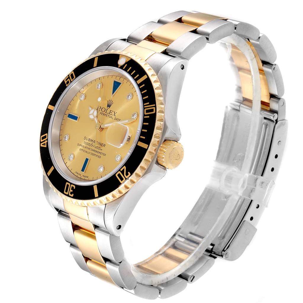 This image shows a side angle of the Rolex Submariner 16613 Men
s Steel and Gold (two tone) Champagne Dial 16613 Men
s Steel and Gold (two tone) Champagne Dial watch, highlighting the bezel, dial, bracelet, and crown.