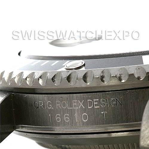 This close-up image of a Rolex Submariner 16610 Men's Stainless Steel Black Dial 16610 Men's Stainless Steel Black Dial shows the side view of the watch's bezel and case with the model number 16610 T engraved.