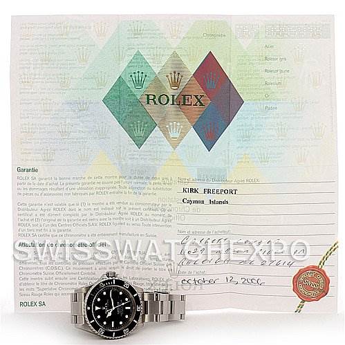 The image shows a front view of a Rolex Submariner 16610 Men's Stainless Steel Black Dial 16610 Men's Stainless Steel Black Dial watch with its accompanying certificate in the background.