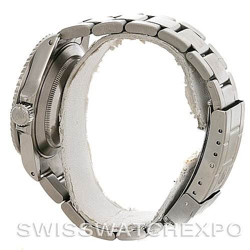 This image shows a Rolex Submariner 16610 Men's Stainless Steel Black Dial 16610 Men's Stainless Steel Black Dial watch from a side angle, highlighting the crown, bezel, and part of the bracelet.