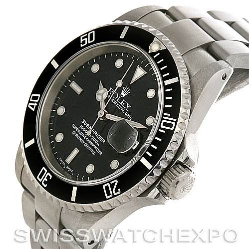 This image shows the dial, bezel, crown, and part of the bracelet of a Rolex Submariner 16610 Men's Stainless Steel Black Dial 16610 Men's Stainless Steel Black Dial watch at a 3/4 angle.