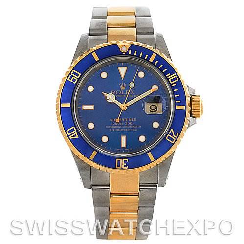 The image shows a front view of a Rolex Submariner 16613 Men's Yellow Gold Blue Dial 16613 Men's Yellow Gold Blue Dial watch featuring a blue dial and bezel, with gold and stainless steel bracelet.
