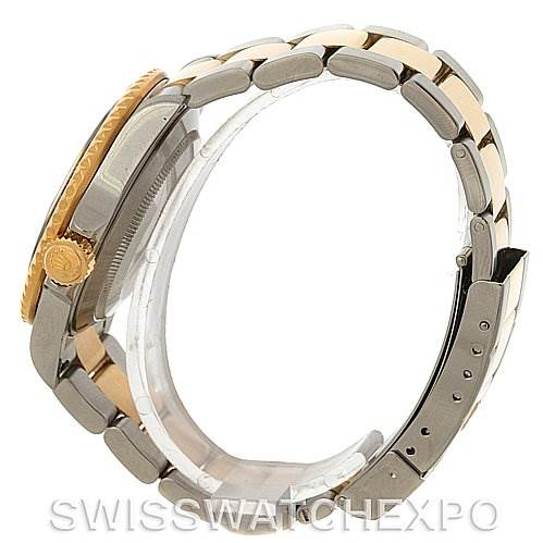 The image shows a side view of a Rolex Submariner 16613 Men's Yellow Gold Blue Dial 16613 Men's Yellow Gold Blue Dial watch, highlighting its bracelet and crown.