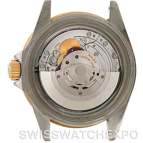 This image shows the open case back view of a Rolex Submariner 16613 Men's Yellow Gold Blue Dial 16613 Men's Yellow Gold Blue Dial watch, revealing its internal movement.