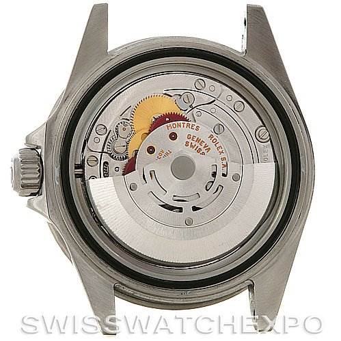 The image shows the exposed movement and internal components of a Rolex Submariner 16610 Men's Stainless Steel Black Dial 16610 Men's Stainless Steel Black Dial watch from a rear view.