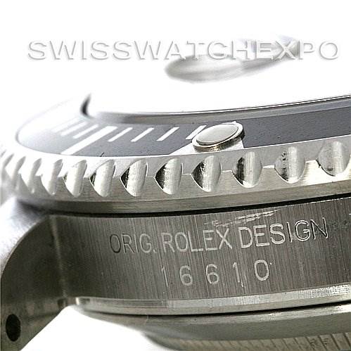The image shows a close-up side view of the bezel and engraving on the casing of a Rolex Submariner 16610 Men's Stainless Steel Black Dial 16610 Men's Stainless Steel Black Dial model.
