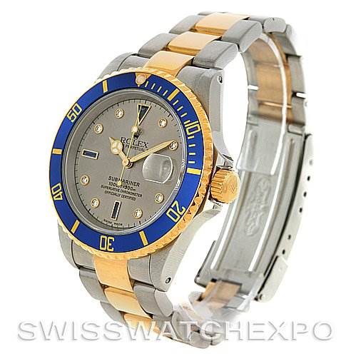The image shows a Rolex Submariner 16613 Men's Yellow Gold Grey Dial 16613 Men's Yellow Gold Grey Dial watch at a three-quarter angle, highlighting the face, bezel, crown, and part of the bracelet.