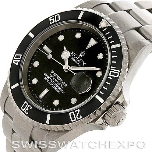 This is a side-angle view of a Rolex Submariner 16610 Men
s Stainless Steel Black Dial 16610 Men
s Stainless Steel Black Dial showing the dial, bezel, crown, and part of the bracelet.