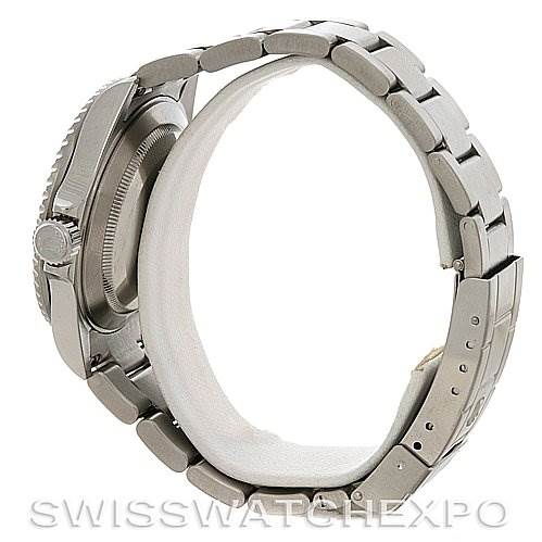 The image shows a side view of a Rolex Submariner 16610 Men
s Stainless Steel Black Dial 16610 Men
s Stainless Steel Black Dial watch, highlighting the bracelet, clasp, and case.