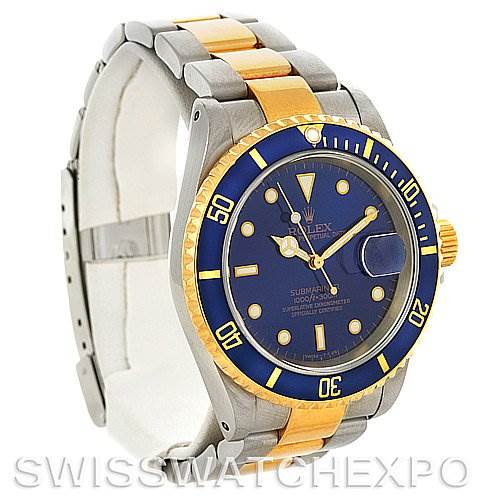 The image shows a side-angle view of a Rolex Submariner 16613 Men's Steel and Gold (two tone) Blue Dial 16613 Men's Steel and Gold (two tone) Blue Dial watch, displaying the bezel, face, and bracelet.
