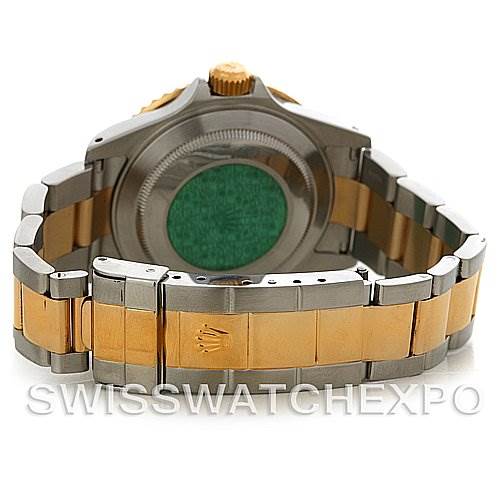 This image shows the back view of the Rolex Submariner 16613 Men's Steel and Gold (two tone) Blue Dial 16613 Men's Steel and Gold (two tone) Blue Dial, highlighting its clasp, bracelet, and case back.