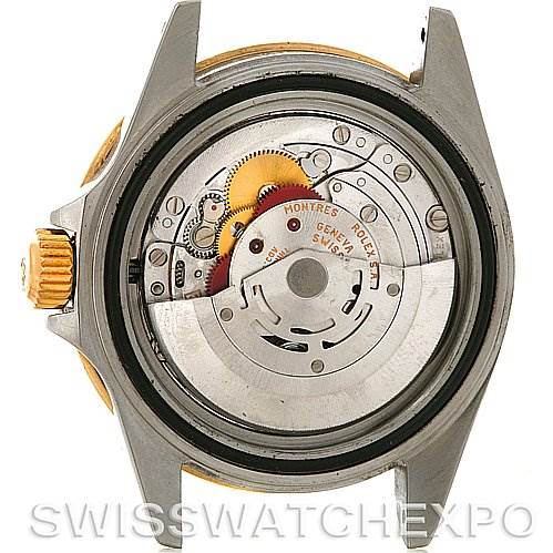 This image shows the inner movement and mechanisms of a Rolex Submariner 16613 Men's Steel and Gold (two tone) Blue Dial 16613 Men's Steel and Gold (two tone) Blue Dial watch from a case back angle.