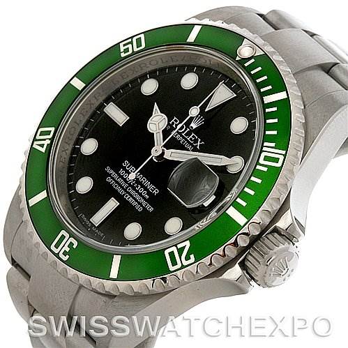 The image shows the Rolex Submariner 16610T Men
s Stainless Steel Black Dial 16610T Men
s Stainless Steel Black Dial watch at an angled close-up, highlighting its green bezel, dial, and crown.