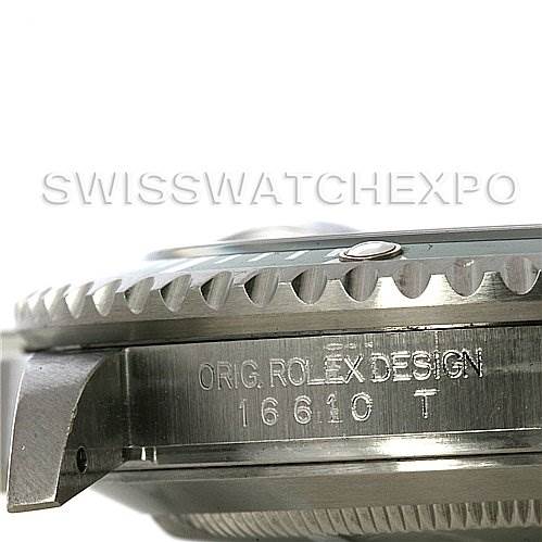 This image shows a close-up of the side and bezel of a Rolex Submariner 16610T Men
s Stainless Steel Black Dial 16610T Men
s Stainless Steel Black Dial model, focusing on its detailed engravings.
