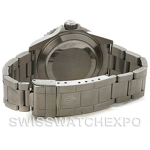 This image shows the backside and bracelet of a Rolex Submariner 16610T Men
s Stainless Steel Black Dial 16610T Men
s Stainless Steel Black Dial watch, angled to display the clasp and caseback.