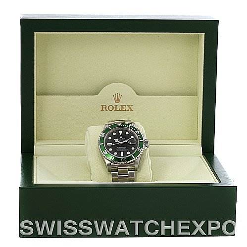 The image shows a Rolex Submariner 16610T Men
s Stainless Steel Black Dial 16610T Men
s Stainless Steel Black Dial watch front view in an open green Rolex box with the Rolex logo clearly visible.