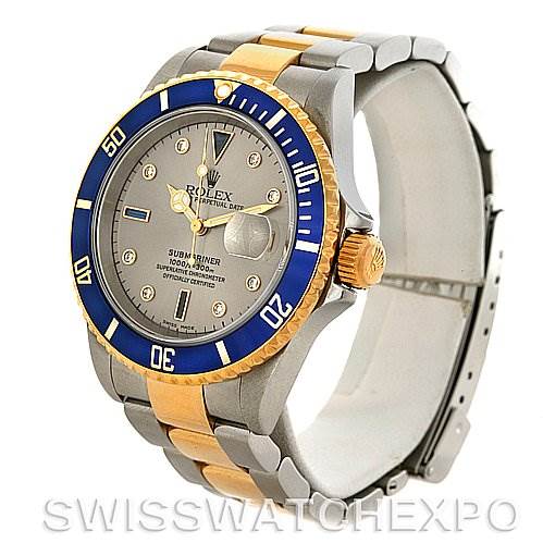 The image shows a side angle of a Rolex Submariner 16613 Men's Steel and Gold (two tone) Grey Dial 16613 Men's Steel and Gold (two tone) Grey Dial watch, highlighting the watch face, bezel, crown, and two-tone bracelet.