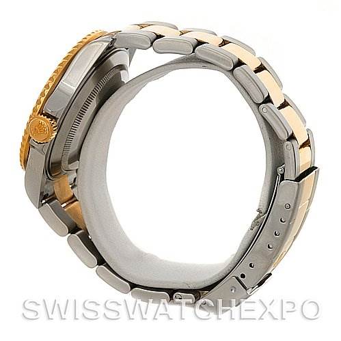 This image shows a side and partial back view of a Rolex Submariner 16613 Men's Steel and Gold (two tone) Grey Dial 16613 Men's Steel and Gold (two tone) Grey Dial watch, highlighting the watch's crown, case, and bracelet.