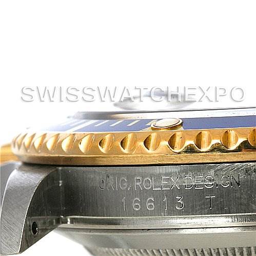 The image shows a close-up side view of a Rolex Submariner 16613 Men's Steel and Gold (two tone) Grey Dial 16613 Men's Steel and Gold (two tone) Grey Dial's case and bezel, highlighting the text "ORIG. ROLEX DESIGN 16613 T."
