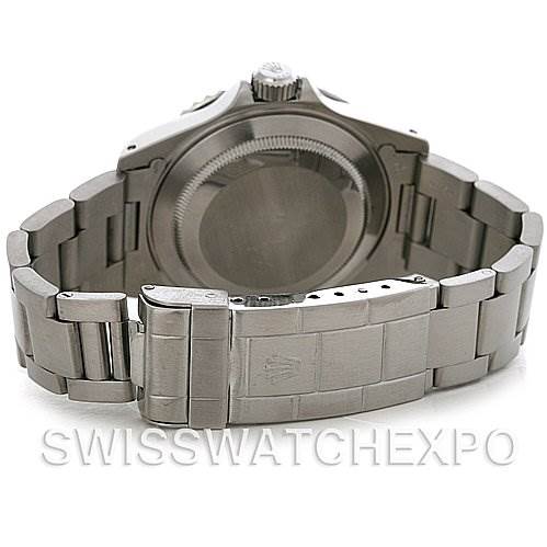 The image shows the back view of a Rolex Submariner 14060M Men's Stainless Steel Black Dial 14060M Men's Stainless Steel Black Dial, emphasizing the clasp, bracelet, and case back.