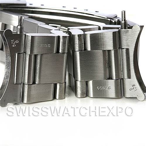 The image shows a close-up view of the clasp of a Rolex Submariner 14060M Men's Stainless Steel Black Dial 14060M Men's Stainless Steel Black Dial watch bracelet.