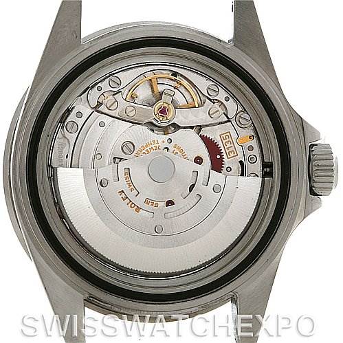 This image shows the movement and internal mechanism of a Rolex Submariner 16610 Men's Stainless Steel Black Dial 16610 Men's Stainless Steel Black Dial from a rear view, with the case back removed.