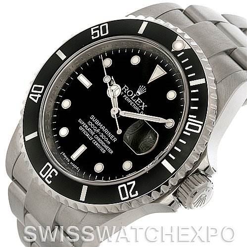 The image shows a Rolex Submariner 16610 Men's Stainless Steel Black Dial 16610 Men's Stainless Steel Black Dial watch from an angled top view, highlighting the dial, bezel, and a portion of the bracelet.