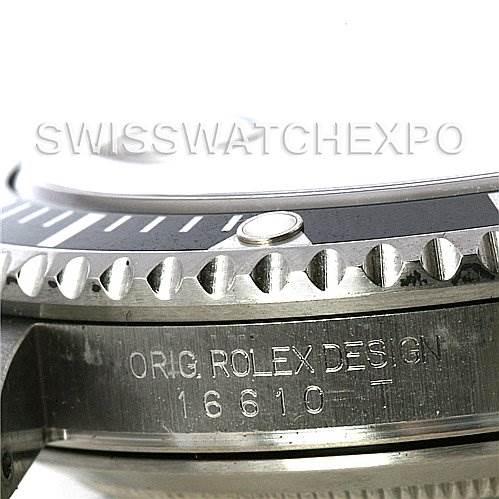 This close-up image of a Rolex Submariner 16610 Men's Stainless Steel Black Dial 16610 Men's Stainless Steel Black Dial shows the bezel, part of the case, and the model number 16610 engraved on the side.