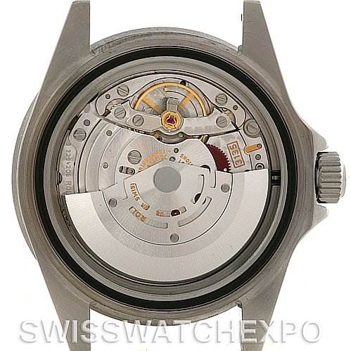 This image shows the back view of the Rolex Submariner 16610 Men's Stainless Steel Black Dial 16610 Men's Stainless Steel Black Dial watch, revealing its inner mechanical movement and rotor.