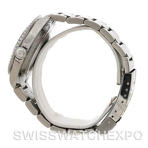 This is a side view of a Rolex Submariner 16610LV Men's Stainless Steel Black Dial 16610LV Men's Stainless Steel Black Dial watch, showing the bracelet, clasp, and part of the case, including the crown.