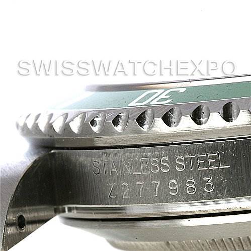 This image shows a close-up angle of the side of a Rolex Submariner 16610LV Men's Stainless Steel Black Dial 16610LV Men's Stainless Steel Black Dial watch, highlighting the bezel and case with part of the serial number visible.