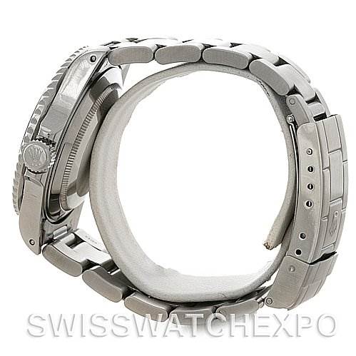 This image shows a side view of a Rolex Submariner 16610 Men's Stainless Steel Black Dial 16610 Men's Stainless Steel Black Dial watch, highlighting its case, crown, and metal bracelet.