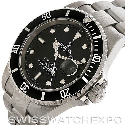 The image shows a Rolex Submariner 16610 Men's Stainless Steel Black Dial 16610 Men's Stainless Steel Black Dial watch from an angled view, highlighting its black dial, bezel, and stainless steel bracelet.
