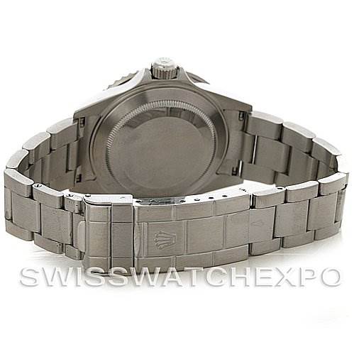 The image shows the back view of a Rolex Submariner 16610 Men's Stainless Steel Black Dial 16610 Men's Stainless Steel Black Dial watch, focusing on the case back, bracelet, and clasp.