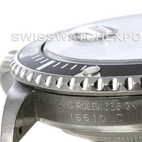 This image shows a close-up side angle of the bezel and case of a Rolex Submariner 16610 Men's Stainless Steel Black Dial 16610 Men's Stainless Steel Black Dial watch, highlighting "ORIG ROLEX DESIGN 16610 T."