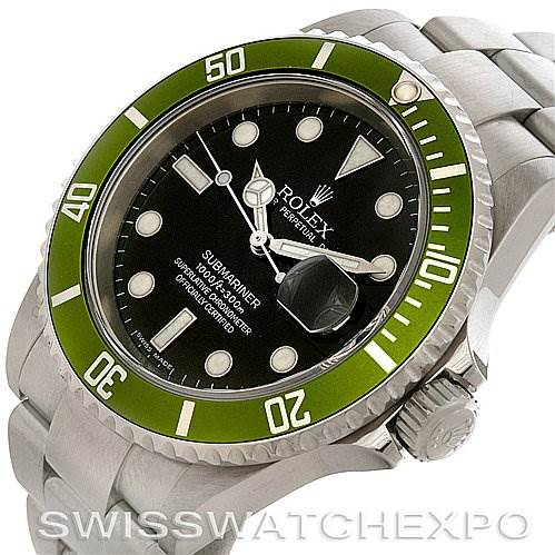 This Rolex Submariner 16610LV Men
s Stainless Steel Black Dial 16610LV Men
s Stainless Steel Black Dial watch is shown at an angle highlighting its green bezel, black dial, date magnifier, and stainless steel bracelet.