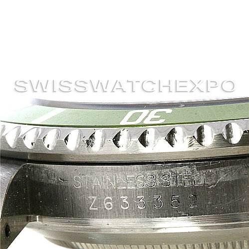 The image shows a side view of the Rolex Submariner 16610LV Men
s Stainless Steel Black Dial 16610LV Men
s Stainless Steel Black Dial watch, highlighting the bezel and part of the stainless steel case with engravings.