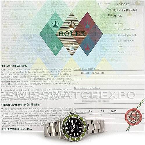 The image shows a front view of a Rolex Submariner 16610LV Men
s Stainless Steel Black Dial 16610LV Men
s Stainless Steel Black Dial watch with visible watch face, bezel, and band, alongside warranty papers.