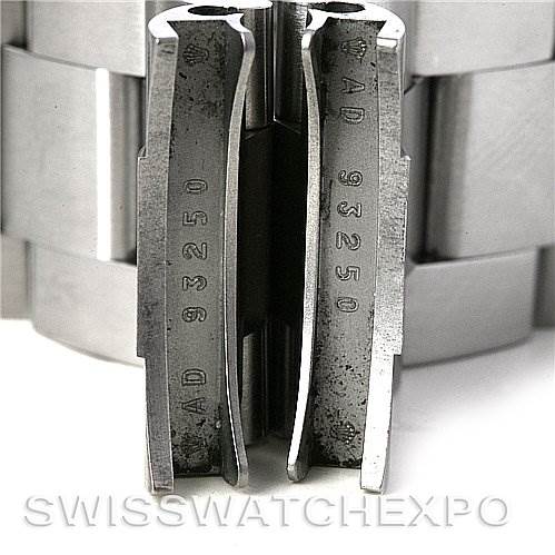 This image shows the interior clasp mechanism of a Rolex Submariner 16610 Men's Stainless Steel Black Dial 16610 Men's Stainless Steel Black Dial watch bracelet with the model number 93250 engraved.