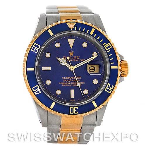 The image shows a frontal view of a Rolex Submariner 16613 Men's Steel and Gold (two tone) Blue Dial 16613 Men's Steel and Gold (two tone) Blue Dial watch featuring a blue dial, yellow gold and stainless steel bracelet, and a date magnifier.