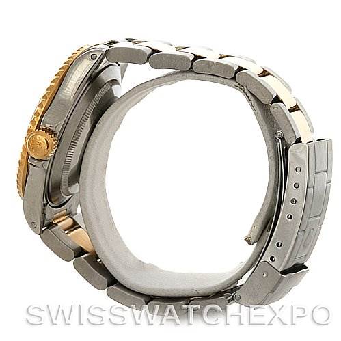 The image shows a side view of the Rolex Submariner 16613 Men's Steel and Gold (two tone) Blue Dial 16613 Men's Steel and Gold (two tone) Blue Dial, highlighting the bracelet, clasp, and crown.