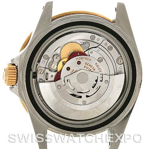 This image shows the internal mechanism, or movement, of the Rolex Submariner 16613 Men's Steel and Gold (two tone) Blue Dial 16613 Men's Steel and Gold (two tone) Blue Dial watch from a rear, open-back angle.