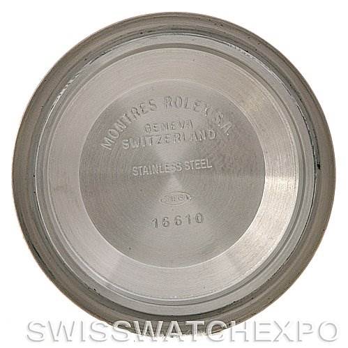 This image shows the inside case back of a Rolex Submariner 16613 Men's Steel and Gold (two tone) Blue Dial 16613 Men's Steel and Gold (two tone) Blue Dial watch, engraved with model details and branding.