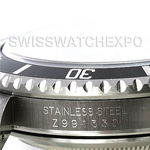 The image shows a close-up side view of the bezel and case with the serial number of a Rolex Submariner 16610 Men's Stainless Steel Black Dial 16610 Men's Stainless Steel Black Dial watch.