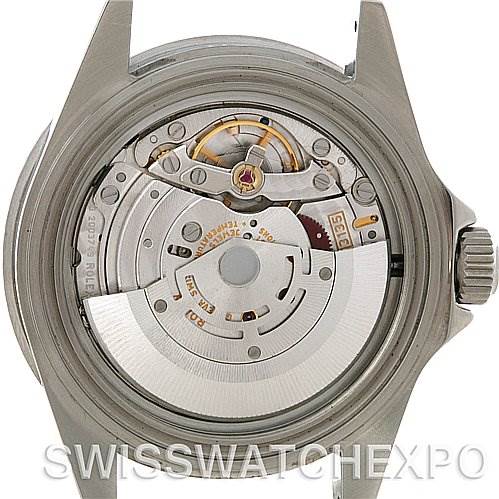 The image shows the back view of the Rolex Submariner 16610 Men's Stainless Steel Black Dial 16610 Men's Stainless Steel Black Dial watch, displaying its exposed movement and inner mechanisms.