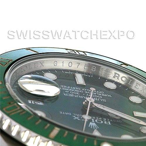 The image shows a close-up angled view of the Rolex Submariner 116610LV Men's Stainless Steel Green Dial 116610LV Men's Stainless Steel Green Dial watch, highlighting the bezel, part of the dial, and the cyclops lens.