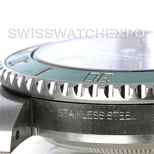 This close-up image of the Rolex Submariner 116610LV Men's Stainless Steel Green Dial 116610LV Men's Stainless Steel Green Dial highlights the stainless steel case and a portion of the green bezel.